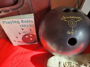 Bowling balls, shoes, boxes & vintage rule book