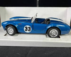 lot 19 image: 124 Revell 1965 Shelby Cobra 427 Racing NOS