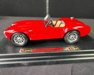 lot 8 image: 124 Die Cast Burago 1965 Red Ford Cobra 427 NOS