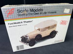 lot 91 image: Vintage Scale Models Metal Ford Model A phaeton Sealed Package In stock