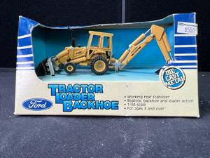 lot 409 image: 164 Ford Backhoe Loader