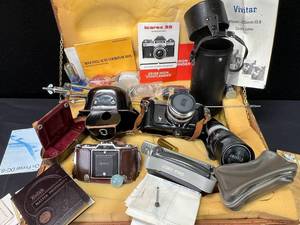 lot 348 image: Various Vintage Cameras and Related Camera Items Lot