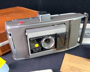 lot 354 image: Vintage Polaroid Electric Eye Land Camera And Accessories