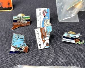 lot 613 image: Lot of Pins Collectable and a Coin