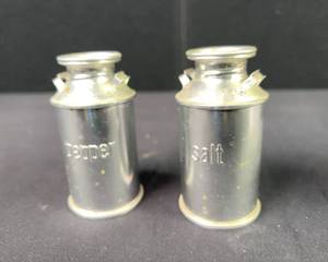 lot 328 image: Salt and Pepper Milk Containers
