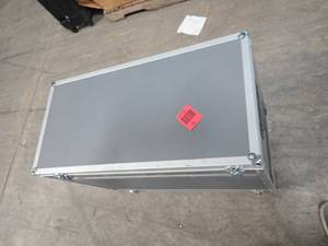 Protective shipping case - has some dort of charger inside measures 15 wd 29 w27 tall
