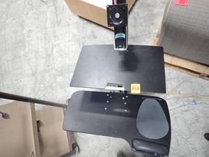 Ergotron adjustable computer desk bottom shelf needs a few screws to tighten up