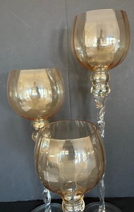 lot 21 image: Trio of Stemmed Glass Candleholders