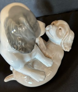 lot 54 image: NAO Playful Puppies Porcelain Figurine
