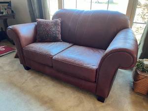 Leather Burgundy Over Stuffed Two Cushion Love Seat