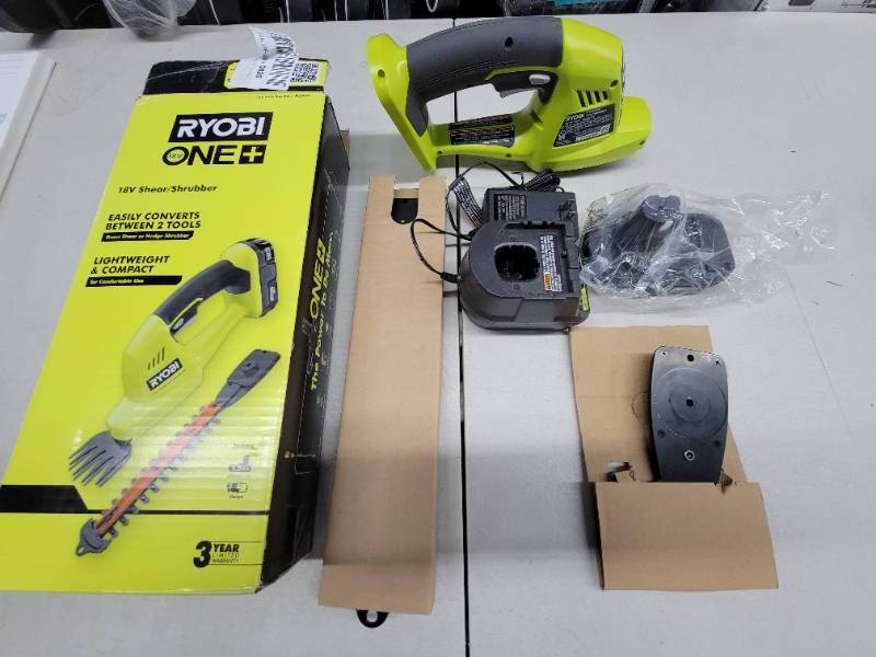 lot 29 image: RYOBI ONE 18-Volt Lithium-Ion Cordless Grass Shear and Shrubber Trimmer - 1.3 Ah Battery and Charger Included, Tested, Works, May Be Slightly Used.