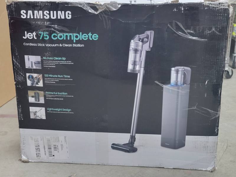 lot 35 image: SAMSUNG Jet 75 Complete Cordless Stick Vacuum Cleaner w Clean Station, Removable Battery, Lightweight, Powerful Cleaning VS20T7551P5AA, Silver -  Slightly Used, Tested and Works Great