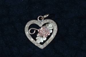 lot 125 image: Heart Pendant - 10K Two Tone Gold