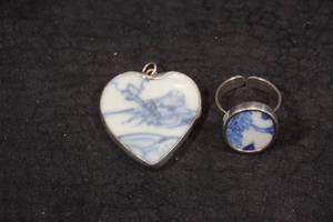 lot 130 image: Sterling Silver Framed Porcelain Pendant and Ring