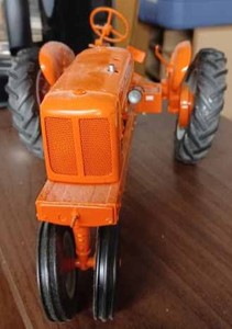 lot 24 image: Franklin Mint Precision Model Allis-Chalmers WC 112 Scale Tractor - No Box, Tractor Rolled off of a Display Shelf and Sustained Damage, Broken Seat, Rear Wheels are Wobbly, and Other Parts are