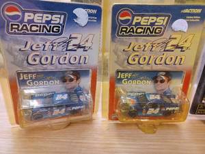 lot 25 image: Two New Action Limited Edition Pepsi Racing Jeff Gordon Nascars in Original Packages, and Two New Racing Champions Nascar 2000 John Deere Motorsports Limited Edition Ford Stock Rods