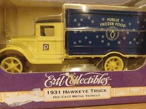 lot 26 image: Two New Ertl Collectibles Publix Trucks Die Cast Metal Banks in Original Boxes - 1923 Chevy and a 1931 Hawkeye Truck