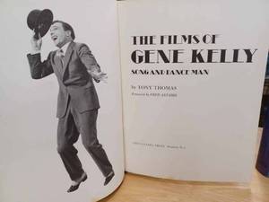lot 37 image: Three Hardcover Books The Films of Gene Kelly - Missing Paper Jacket, The Hollywood Musical, and The American President