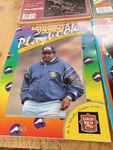 lot 56 image: Two Vintage Twilight Zone Magazines from 1981, Two Vintage Color and Activity Books, and a Minnesota Vikings Playbook