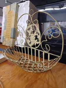 lot 74 image: Folk Art Decorative Metal Wall Basket and Plaque with Cast Iron Utensils, Metal Door Hanger, New Welcome Sign, and a New Lyme Disease Prevention Sign from the CDC