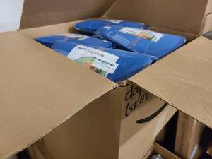 Box of brand new dog cones in various sizes