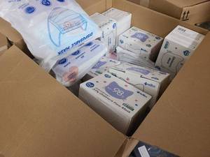 Box of mostly childrens face masks