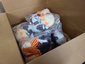 Box of new sun and moon themed stuffed toys