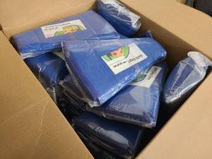 Box of brand new dog cones in various sizes
