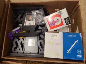 Box of grad gear and extras