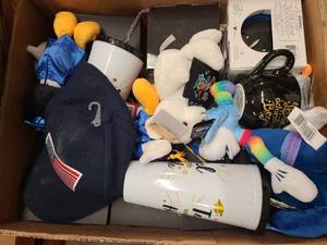Box of Graduation toys, gears and mugs