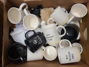 Box of new coffee mugs