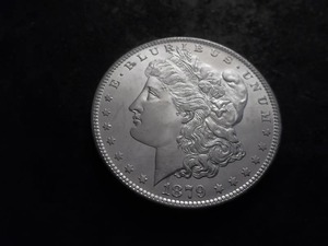 lot 7 image: 1879 S Morgan Silver Dollar
