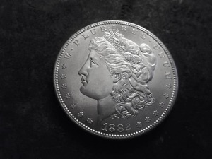 lot 11 image: 1882 S Morgan Silver Dollar