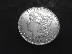 lot 19 image: 1886 Morgan Silver Dollar