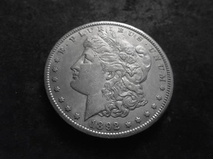 lot 27 image: 1892 CC Morgan Silver Dollar