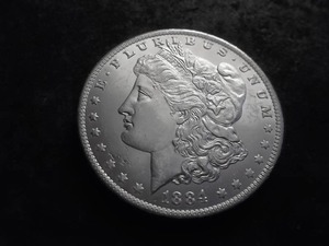 lot 15 image: 1884 Morgan Silver Dollar