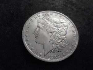 lot 16A image: 1884 O Morgan Silver Dollar