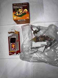lot 21 image: Pokeman Watch, Build a Rattlesnake & Stag Dragon Figure