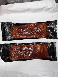 lot 33 image: A 2x St. Louis Style Pork Short Ribs -Fully Cooked (Smoked) WBBQ Sauce Average Package Weight 2.30lbs