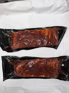 lot 34 image: A 2x St. Louis Style Pork Short Ribs -Fully Cooked (Smoked) WBBQ Sauce Average Package Weight 2.30lbs