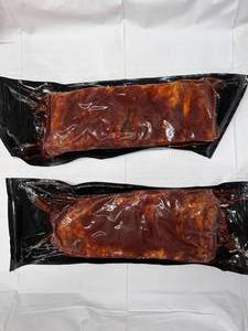lot 36 image: A 2x St. Louis Style Pork Short Ribs -Fully Cooked (Smoked) WBBQ Sauce Average Package Weight 2.30lbs