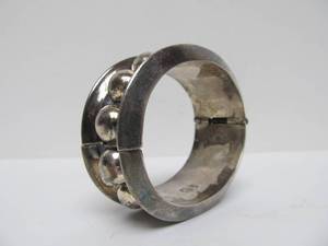 lot 104 image: Large Sterling Silver Signed TAXCO Bracelet