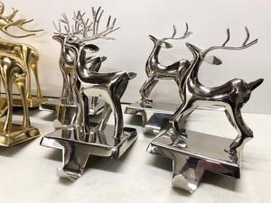 lot 161 image: Mint Condition Heavy Chrome & Gold Reindeer Stocking Holders from Crate & Barrell