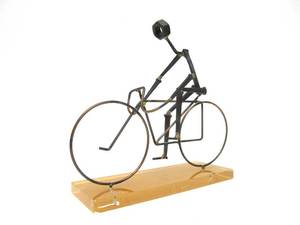 lot 272 image: Original Patty Kahn Cyclist Metal Artwork on Lucite Base Signed 7