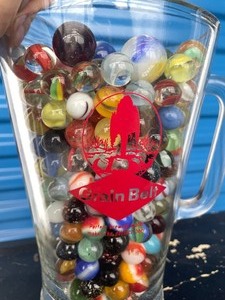 lot 219 image: Vintage Grain Belt Beer Pitcher FULL of Old Marbles