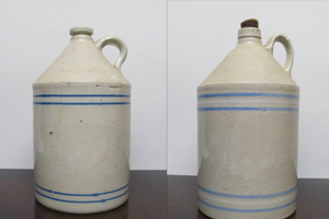 lot 234 image: Pair of Antique RCP Akron Stoneware Jugs wBlue Stripes  Rings