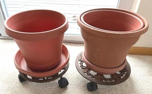 lot 266 image: Pair of Rolling Cast Iron Planter Stands and Pots (NO ONSITE PAYMENTS ACCEPTED.  PAY ONLINE BEFORE PICK-UP)