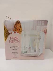 lot 17 image: NEW PARIS HILTON MINI BEAUTY FRIDGE