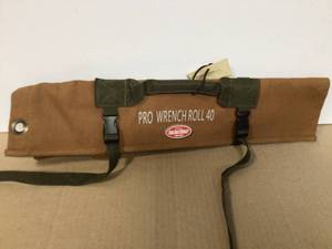 lot 31 image: BUCKET BOSS 23 in. Professional Big Wrench Tool Roll with 40 Tool Bag Storage Pockets Customer Returns See Pictures