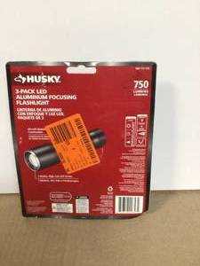 lot 24 image: Husky 750 Lumens Focusing Aluminum LED Flashlights 3 Modes Impact and Water Resistant with Batteries (3-Pack) Customer Returns See Pictures